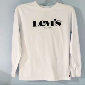 The brand is Levis, and the size is Large 12-13 yrs